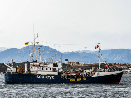 This photo taken on September 25, 2020 and provided by Italian news agency ANSA shows the Alan Kurdi rescue ship from German aid organisation Sea-Eye arriving at the port of Olbia in Sardinia, with 125 rescued migrants aboard. - The ship -- named Alan Kurdi after the Syrian boy who …