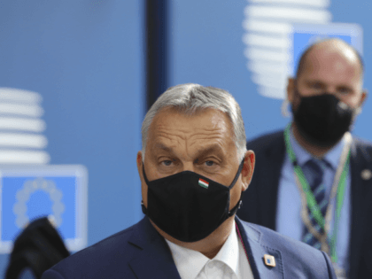 Hungary's Prime Minister Viktor Orban wearing face mask arrives ahead of a two days European Union (EU) summit at the European Council Building in Brussels, on October 15, 2020. - European leaders meet to re-examine the post-Brexit talks under pressure from English Prime Minister to give ground or see Britain …