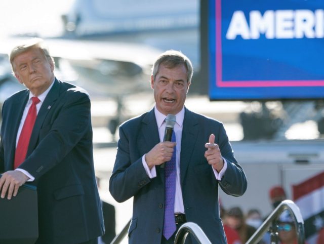 US President Donald Trump listens as Nigel Farage (R) speaks during a Make America Great A