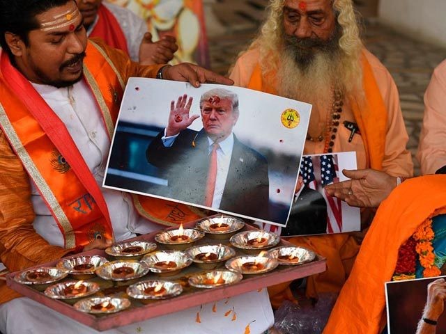 Activists of Hindu Sena, a right wing group, take part in a prayer ceremony for the victor