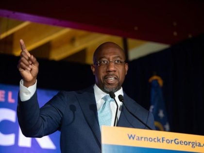 ATLANTA, GA - NOVEMBER 03: Democratic U.S. Senate candidate Rev. Raphael Warnock speaks during an Election Night event on November 3, 2020 in Atlanta, Georgia. Democratic Senate candidate Rev. Raphael Warnock is running in a special election against a crowded field, including U.S. Sen. Kelly Loeffler (R-GA), who was appointed …