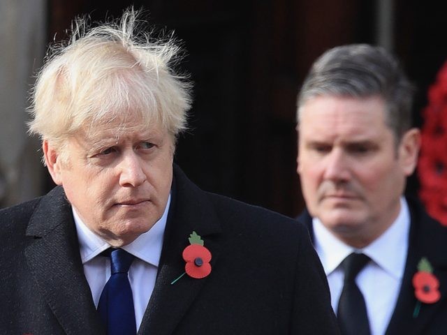 Britain's Prime Minister Boris Johnson (L) and Britain's main opposition Labour Party lead