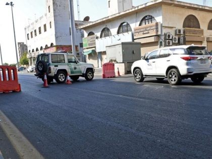 Saudi police close a street leading to a non-Muslim cemetery in the Saudi city of Jeddah where a bomb struck a World War I commemoration attended by European diplomats on November 11, 2020 leaving several people wounded amid Muslim anger over French cartoons. - The attack is the second assault …