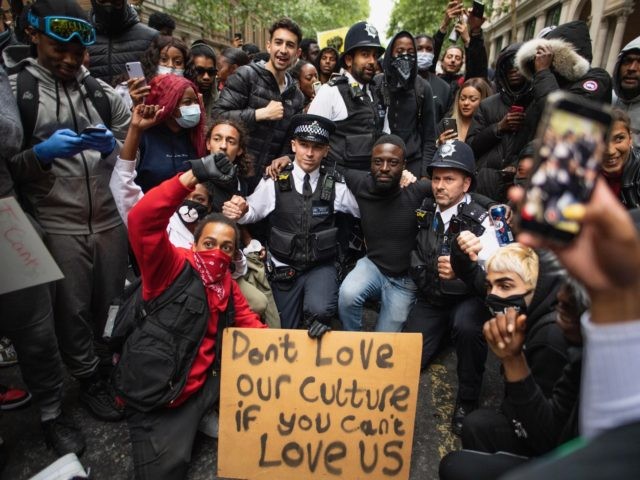 LONDON, ENGLAND - JUNE 03: Protesters and police come together during a Black Lives Matter protest on June 03, 2020 in London, England. The death of an African-American man, George Floyd, while in the custody of Minneapolis police has sparked protests across the United States, as well as demonstrations of …