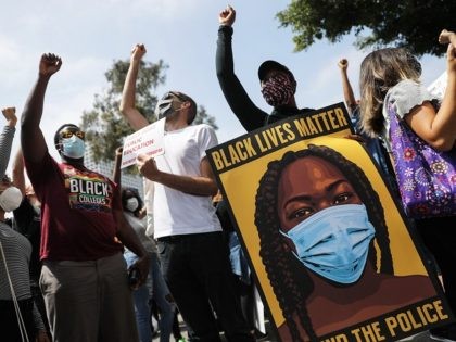 LOS ANGELES, CALIFORNIA - JUNE 23: Black Lives Matter-Los Angeles supporters protest outside the Unified School District headquarters calling on the board of education to defund school police on June 23, 2020 in Los Angeles, California. The demonstrators want the funds currently spent on campus police to be reallocated to …