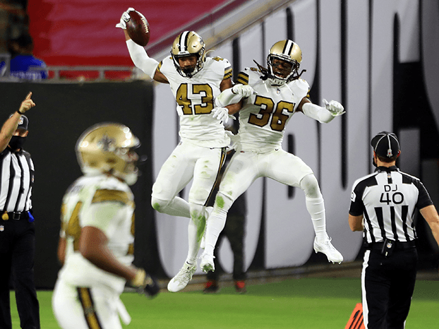 Marcus Williams #43 of the New Orleans Saints celebrates with D.J. Swearinger #36 after in