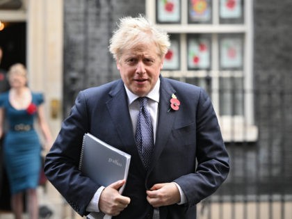 LONDON, ENGLAND - NOVEMBER 10: Britain's Prime Minister Boris Johnson leaves number 10, Downing Street as he heads to the weekly Cabinet meeting at the Foreign Office on November 10, 2020 in London, England. (Photo by Leon Neal/Getty Images)