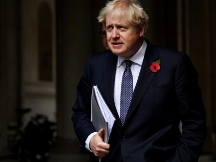 LONDON, ENGLAND - NOVEMBER 10: Britain's Prime Minister Boris Johnson returns to number 10