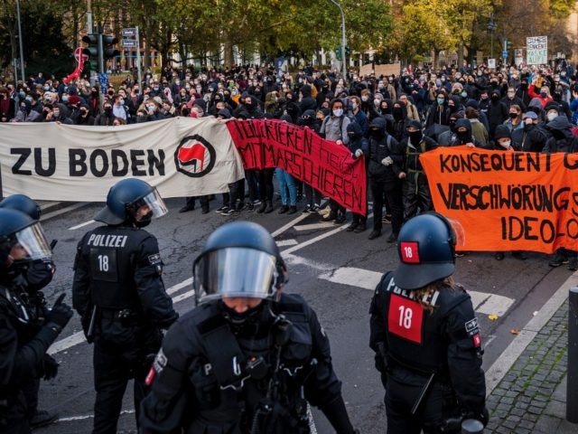 FRANKFURT AM MAIN, GERMANY - NOVEMBER 14: Left-wing antifa counter-demonstrators block a s