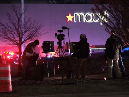 A television news crew reports from outside the Mayfair Mall after a gunman opened fire on November 20, 2020 in Wauwatosa, Wisconsin. Several people were reported to have been injured with the gunman still at large. (Photo by Scott Olson/Getty Images)