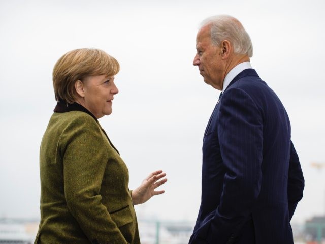 BERLIN, GERMANY - FEBRUARY 01: In this photo provided by the German Government Press Office (BPA) German Chancellor Angela Merkel (L) speaks with US Vice President Joe Biden at the start of their meeting at the Chancellery on February 01, 2013 in in Berlin, Germany. The Munich Security Conference is …