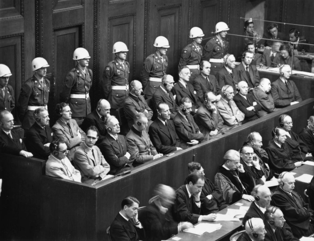 Leading Nazis in the dock in the courtroom at Nuremberg during the final stages of the war crimes trials. Front row, from left to right: Hermann Goering, Rudolf Hess, Joachim von Ribbentrop and Wilhelm Keitel. Second row, 3rd and 4th from left: Baldur Von Schirach and Fritz Sauckel. (Photo by Fred Ramage/Getty Images)
