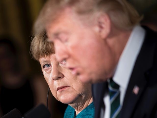 US President Donald Trump and German Chancellor Angela Merkel hold a joint press conference in the East Room of the White House in Washington, DC, on March 17, 2017. / AFP PHOTO / Brendan Smialowski (Photo credit should read BRENDAN SMIALOWSKI/AFP via Getty Images)