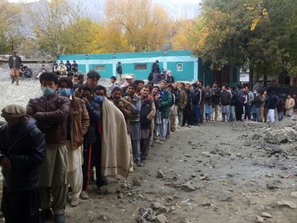People queue to cast their ballot at a polling station during the legislative assembly election in Skardu city in Gilgit-Baltistan region of Pakistan on November 15, 2020. (Photo by Syed Mehdi SHAH / AFP) (Photo by SYED MEHDI SHAH/AFP via Getty Images)