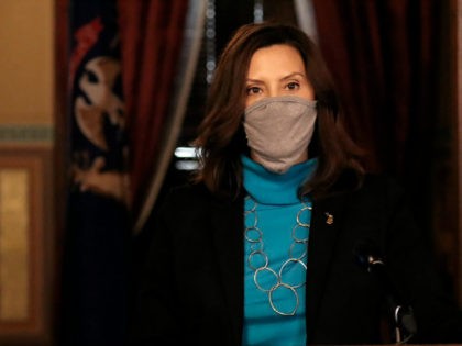 In a photo provided by the Michigan Office of the Governor, Gov. Gretchen Whitmer addresses the state during a speech in Lansing, Mich., Thursday, Nov. 12, 2020. Hospital leaders warned Thursday that more than 3,000 people are hospitalized with the coronavirus in Michigan, a rate that is doubling every two …