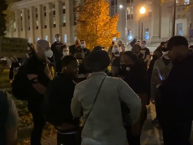 Protesters march in Indianapolis after grand jury declines to indict police officer. (Twitter Video Screenshot/Mike Sullivan)