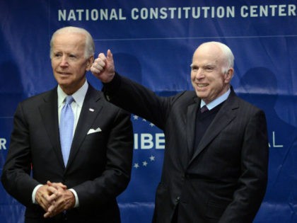 Sen. John McCain (R-AZ) give a thumbs up before receiving the the 2017 Liberty Medal from former Vice President Joe Biden (left) at the National Constitution Center on October 16, 2017 in Philadelphia, Pennsylvania. (Photo by William Thomas Cain/Getty Images)