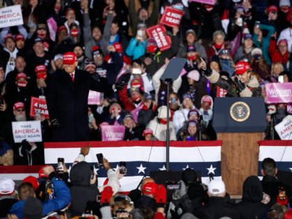 GRAND RAPIDS, MI - NOVEMBER 03: Rapper Lil Pump (R) speaks next to President Donald Trump during a rally on November 3, 2020 in Grand Rapids, Michigan. Trump and Democratic presidential nominee Joe Biden are making last-minute stops in swing states ahead of tomorrow's general election. (Photo by Kamil Krzaczynski/Getty …
