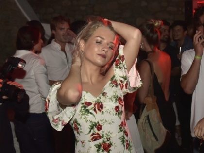 MYKONOS, GREECE - JULY 29: Lottie Moss dances during Velocity Black party on July 29, 2017 in Mykonos, Greece. (Photo by Milos Bicanski/Getty Images for Velocity Black)