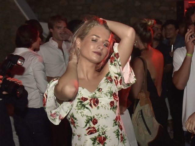 MYKONOS, GREECE - JULY 29: Lottie Moss dances during Velocity Black party on July 29, 2017