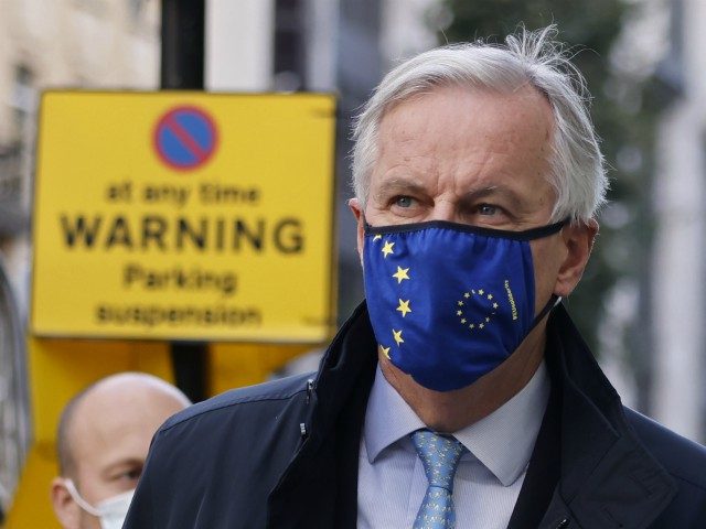 EU chief negotiator Michel Barnier wearing a face mask because of the novel coronavirus pa