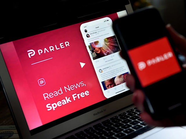 This illustration picture shows social media application logo from Parler displayed on a s