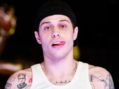 US comedian Pete Davidson walks as a model for Alexander Wang's fashion show at the R