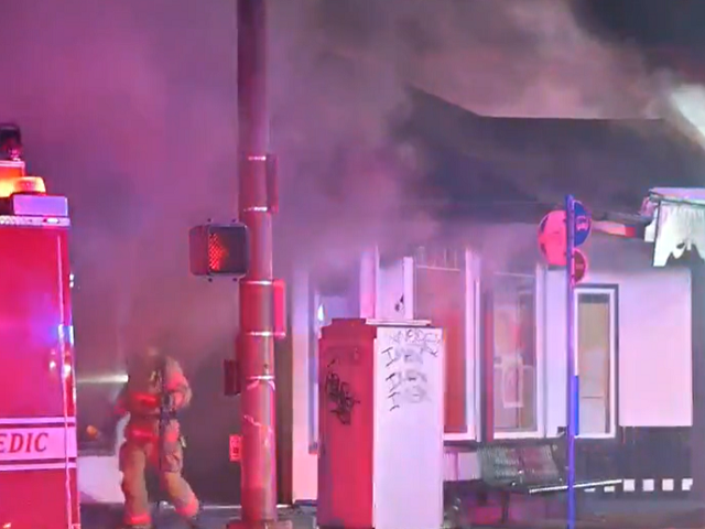 Portland firefighters battle a blaze at Reo's Ribs just days after vandals struck neighboring businesses. (Image: KOIN CBS6 Video Screenshot)