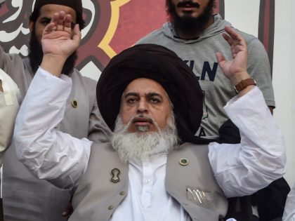 Khadim Hussain Rizvi, head of the Tehreek-e-Labaik Pakistan (TLP), a hardline religious political party, gestures as he leads a protest against the reprinting of satirical sketches of the Prophet Mohammad by French magazine Charlie Hebdo, in Lahore on September 4, 2020. - French satirical weekly Charlie Hebdo, the target of …