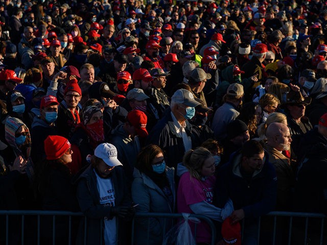 BUTLER, PA - OCTOBER 31: Supporters listen as President Donald Trump speaks at a campaign rally at Pittsburgh-Butler Regional Airport on October 31, 2020 in Butler, Pennsylvania. Donald Trump is crossing the crucial state of Pennsylvania in the last few days of campaigning before Americans go to the polls on …