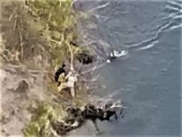 WATCH: Uzbekistani Migrant Rescued from Texas Border River