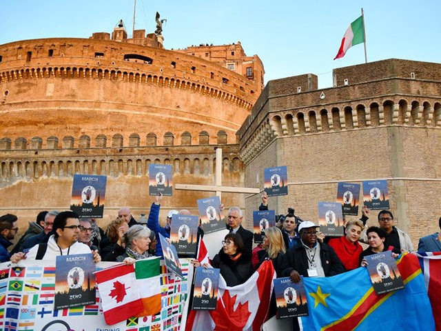 Members of Ending Clergy Abuse (ECA), a global organization of prominent survivors and activists who are in Rome for this weeks papal summit on the sex abuse crisis within the Catholic Church, hold a protest gathering on February 21, 2019 by the Castel Sant'Angelo in Rome . - Pope Francis …