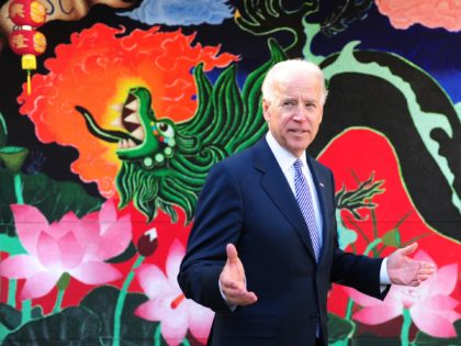 US Vice President Joe Biden gestures while meeting with the media following a visit with his Chinese Xi Jingping to the International Studies Learning School in Southgate, outside of Los Angeles, on February 17, 2012. Xi's trip is the first to Los Angeles by a top-level Chinese leader for 13 …