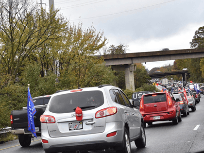 A caravan of more than 100 vehicles traveled from Virginia around the Capital Beltway in Washington, DC, to show their support for President Donald Trump on the Sunday before the November 3 election.