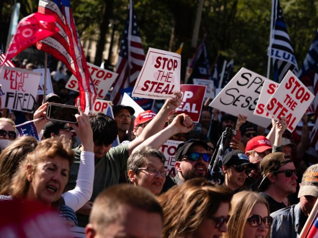 ATLANTA, GA - NOVEMBER 21: Protesters rally outside the Georgia State Capitol during a 'March for Trump' protest against the results of the 2020 Presidential election on November 21, 2020 in Atlanta, Georgia. This week Georgia finished their hand recount of the ballots which also confirmed President-Elect Joe Biden's win …