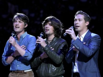OKLAHOMA CITY, OK - MAY 21: (L-R) Isaac Hanson, Zac Hanson and Taylor Hanson of the group Hanson preform the national anthem before Game Three of the Western Conference Finals during the 2011 NBA Playoffs between the Oklahoma City Thunder and the Dallas Mavericks at Oklahoma City Arena on May …