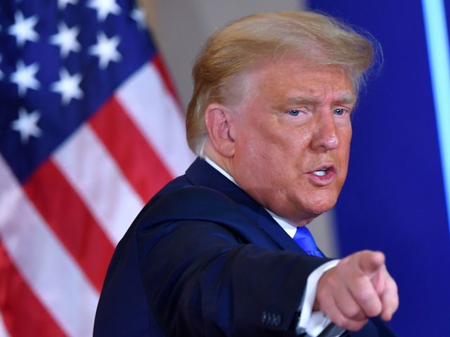 US President Donald Trump gestures after speaking during election night in the East Room o