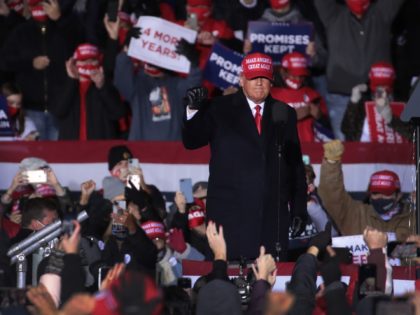 KENOSHA, WISCONSIN - NOVEMBER 02: President Donald Trump speaks to supporters during a campaign rally at the Kenosha Regional Airport on November 02, 2020 in Kenosha, Wisconsin. Trump, who won Wisconsin with less than 1 percent of the vote in 2016, currently trails former vice president and Democratic presidential candidate …