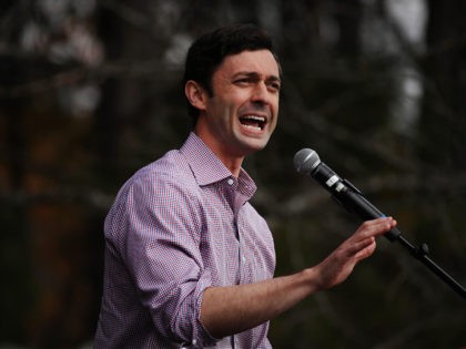 LILBURN, GEORGIA - DECEMBER 07: Jon Ossoff, Democratic candidate for the U.S. Senate, speaks at a campaign event to register Democrats to vote in the January 5th senate runoff election on December 07, 2020 in Lilburn, Georgia. Ossoff is running against Sen. David Perdue (R-GA) while his fellow Democrat, Rev. …