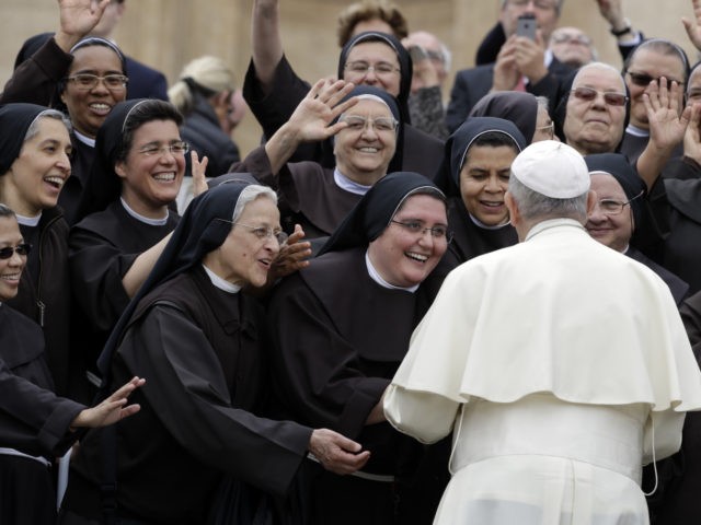 Pope Francis meets a group of Franciscan nuns during his weekly general audience, in St. P