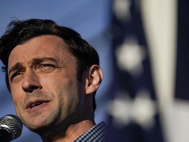 Georgia Democratic candidate for U.S. Senate Jon Ossoff speaks during a rally on Sunday, Nov. 15, 2020, in Marietta, Ga. Ossoff and Republican candidate for Senate Sen. David Perdue are in a runoff election for the Senate seat. (AP Photo/Brynn Anderson)