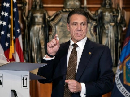 In this photo provided by the Office of Gov. Andrew M. Cuomo, Cuomo holds up samples of empty packaging for the COVID-19 vaccine during a news conference in the Red Room at the State Capitol in Albany, N.Y., Thursday, Dec. 3, 2020. (Mike Groll/Office of Governor of Andrew M. Cuomo …