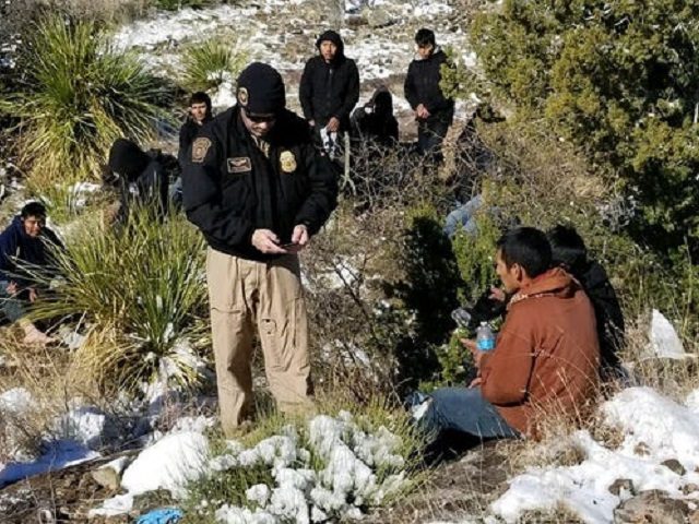 Border Patrol agents rescue a group of migrants in freezing conditions. (Photo: U.S. Borde
