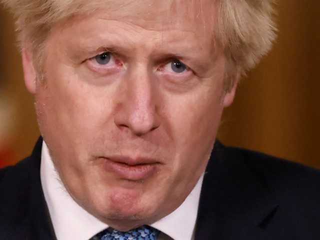 LONDON, ENGLAND - DECEMBER 21: Britain's Prime Minister, Boris Johnson speaks during a vir