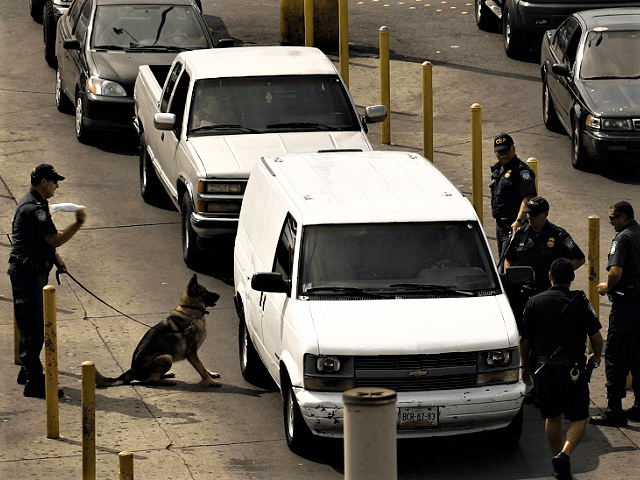 CBP K-9 alerts to an odor it is trained to detect at a U.S. border crossing. (AP File Phot