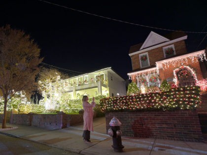 NEW YORK, NEW YORK - DECEMBER 06: Houses are decorated with Christmas lights and ornaments in the Dyker Heights section of Brooklyn on December 06, 2020 in New York City. The Dyker Heights Christmas-decorated residences are an annual attraction but have been scaled back this year due to Covid-19. (Photo …