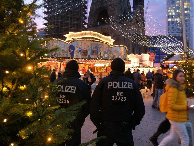 BERLIN, GERMANY - DECEMBER 19: Police keep an eye out at the annual Christmas market at Br