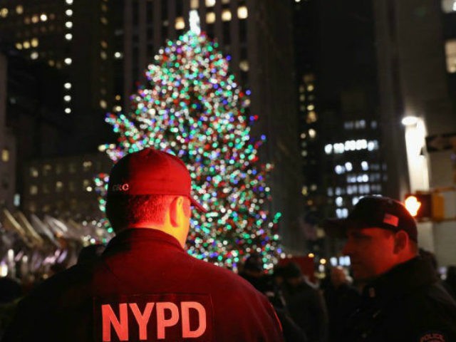 Counterterrorism police stand guard near the Christmas tree at Rockefeller Center in New Y