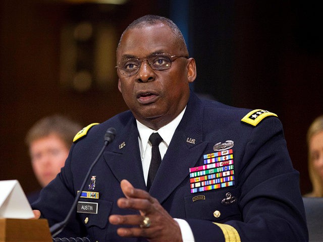 FILE - In this Sept. 16, 2015, photo, U.S. Central Command Commander Gen. Lloyd Austin III, testifies on Capitol Hill in Washington. Biden will nominate retired four-star Army general Lloyd J. Austin to be secretary of defense. That's according to three people familiar with the decision who spoke on condition …