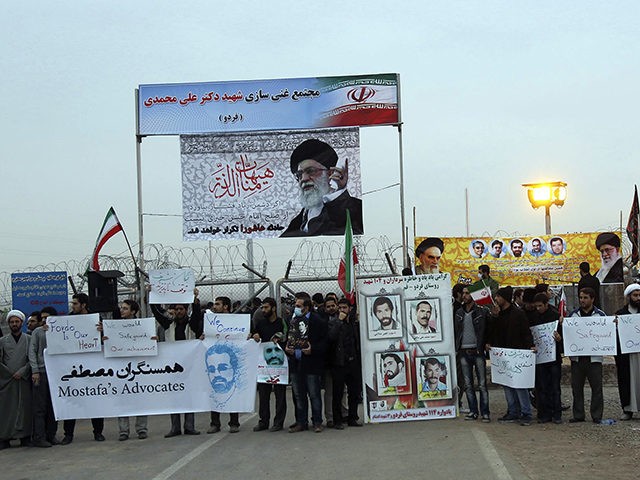 Iranian students carrying anti-US placards and portraits of the Islamic republic's supreme leader Ayatollah Ali Khamenei protest outside the Fordo Uranium Conversion Facility in Qom, in the north of the country, on November 19, 2013. Iran said there was "every possibility" of a deal at international talks on its nuclear …